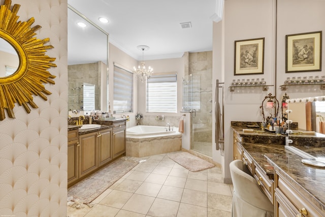 bathroom with vanity, tile patterned flooring, independent shower and bath, ornamental molding, and a chandelier