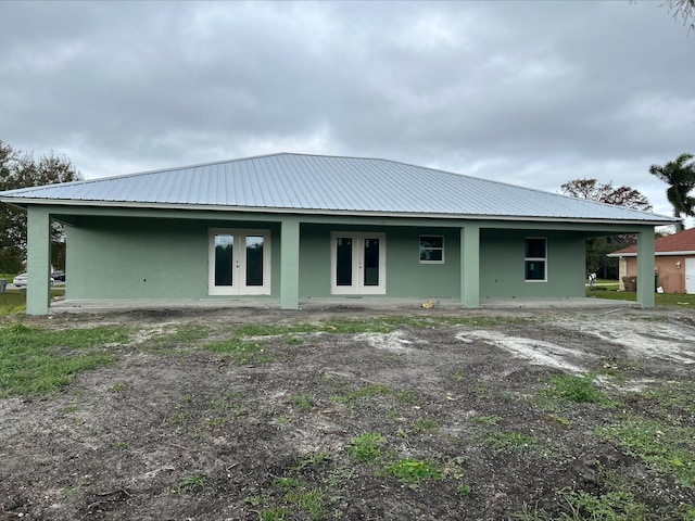 back of property with french doors