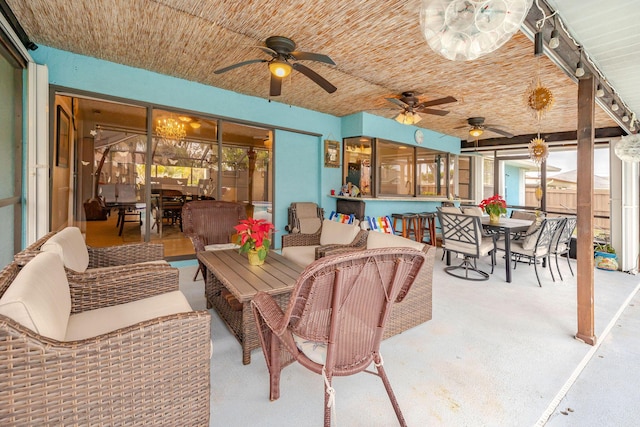 view of patio with an outdoor hangout area, an outdoor bar, and ceiling fan