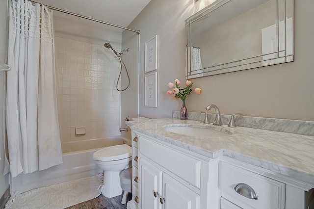 full bathroom featuring wood-type flooring, toilet, vanity, and shower / bath combination with curtain