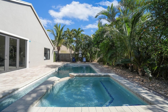 view of swimming pool with a patio