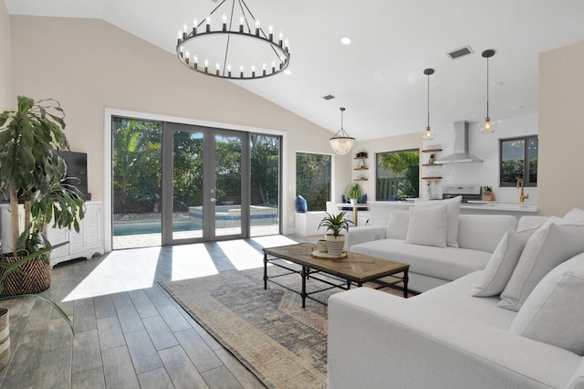 living room featuring high vaulted ceiling