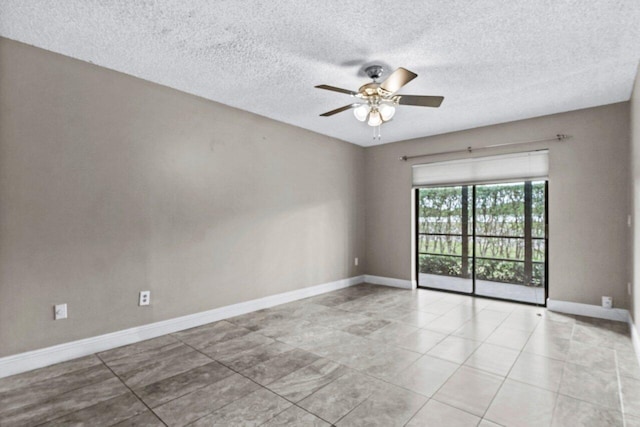 empty room featuring ceiling fan