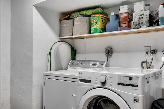 laundry room with washer and dryer