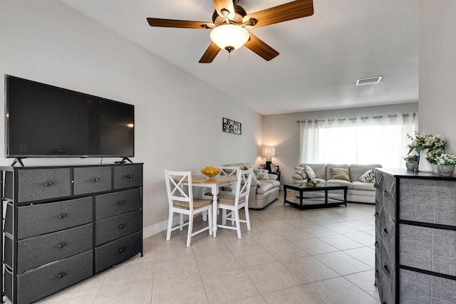 living room with light tile patterned floors