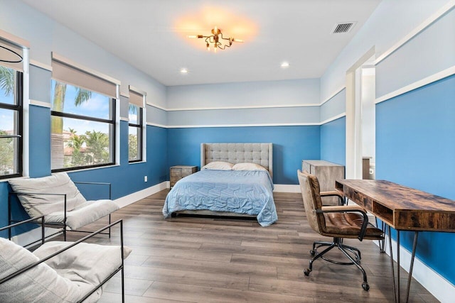 bedroom featuring dark hardwood / wood-style floors