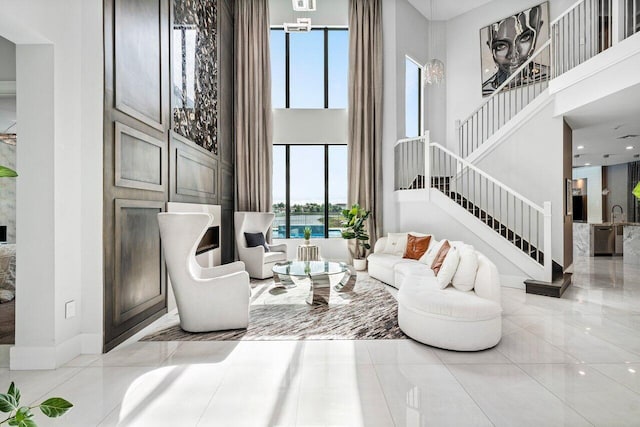 living room with a high ceiling