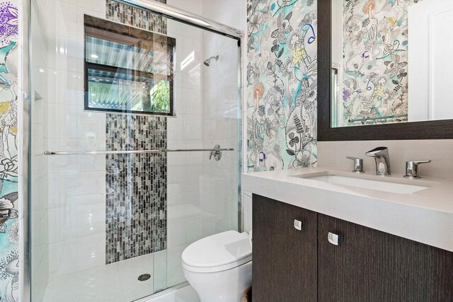9748 Rennes Ln, Delray Beach, FL 33446 - full bathroom with vanity, toilet, and a shower stall