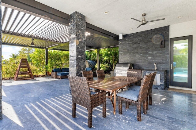 view of patio / terrace with ceiling fan, sink, an outdoor hangout area, and area for grilling