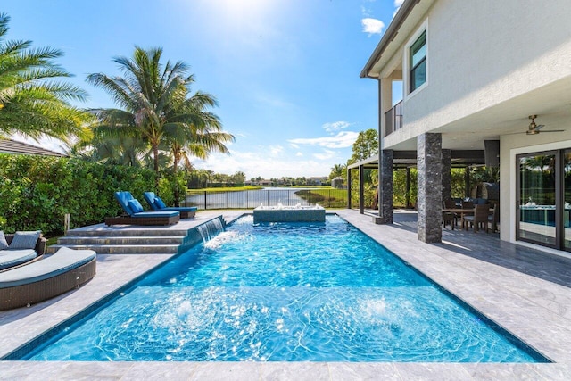9748 Rennes Ln, Delray Beach, FL 33446 - view of swimming pool with a patio, a fenced backyard, a fenced in pool, a ceiling fan, and a water view