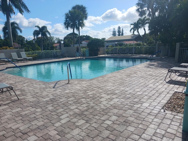 view of pool featuring a patio