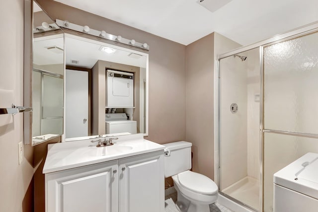 full bathroom featuring toilet, a shower stall, and stacked washer / drying machine