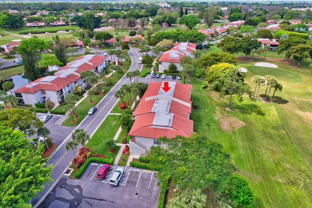 aerial view featuring a residential view and view of golf course