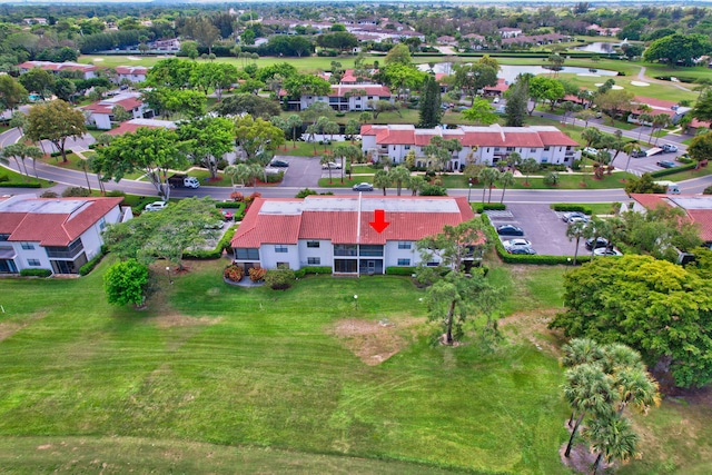 aerial view with view of golf course and a residential view