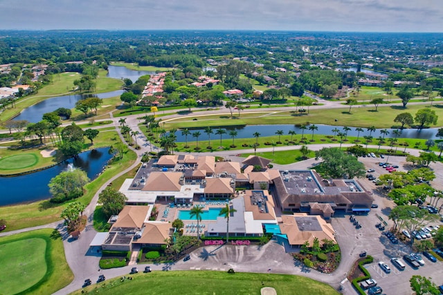 aerial view with a water view and golf course view