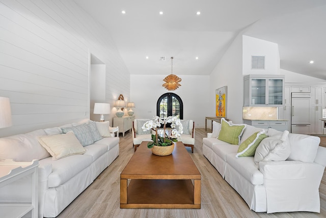 189 Shelter Ln, Jupiter Inlet Colony, FL 33469 - living area with high vaulted ceiling, light wood-style floors, and recessed lighting