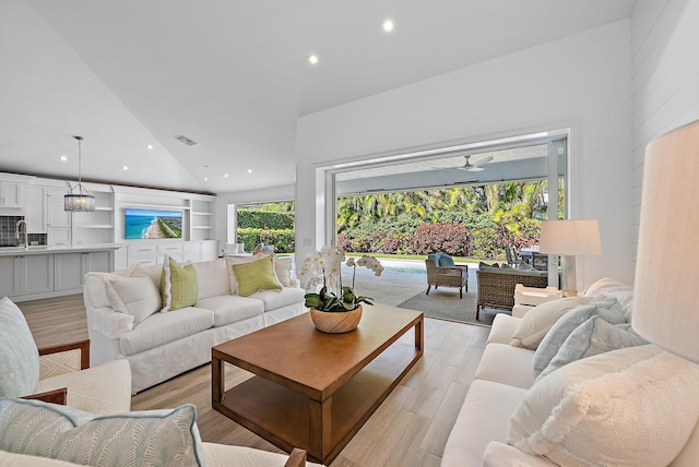 189 Shelter Ln, Jupiter Inlet Colony, FL 33469 - living area with vaulted ceiling, light wood-type flooring, ceiling fan, and recessed lighting