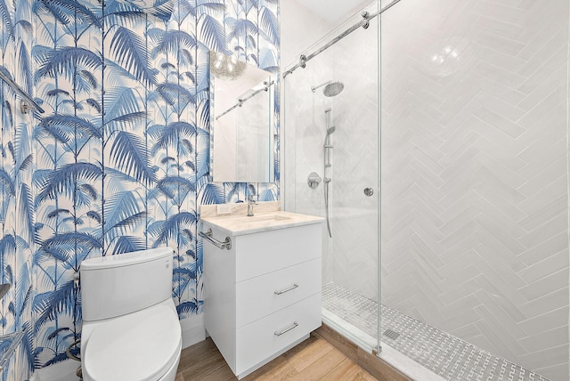 189 Shelter Ln, Jupiter Inlet Colony, FL 33469 - bathroom with a shower stall, toilet, vanity, and wood finished floors