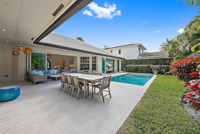 189 Shelter Ln, Jupiter Inlet Colony, FL 33469 - view of pool with a fenced in pool, outdoor dining space, a patio area, an outdoor living space, and a lawn