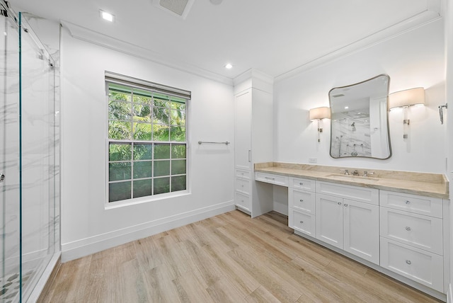189 Shelter Ln, Jupiter Inlet Colony, FL 33469 - full bath featuring ornamental molding, a marble finish shower, vanity, wood finished floors, and recessed lighting