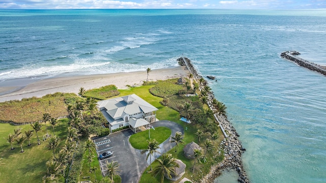 aerial view with a water view and a view of the beach