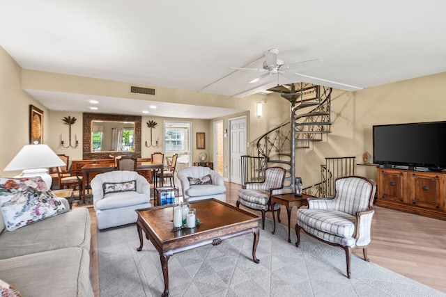 living room with ceiling fan