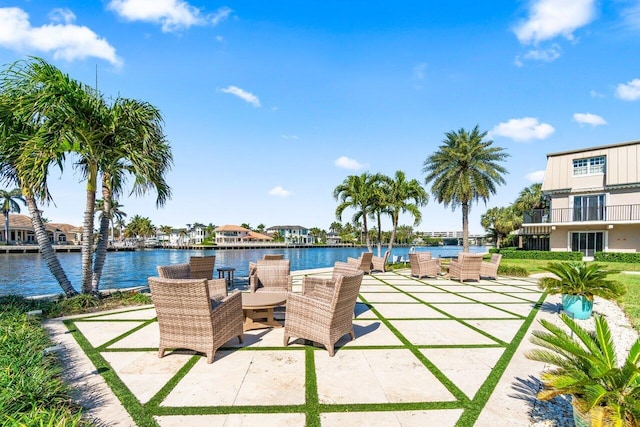 view of patio / terrace with a water view