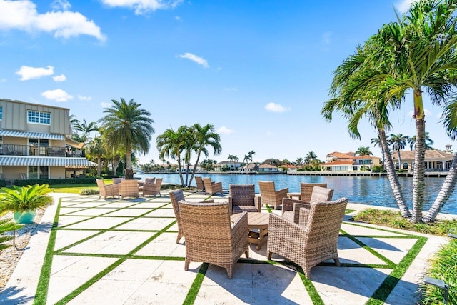 view of patio with a water view