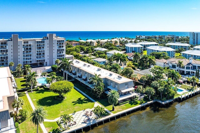 drone / aerial view with a water view