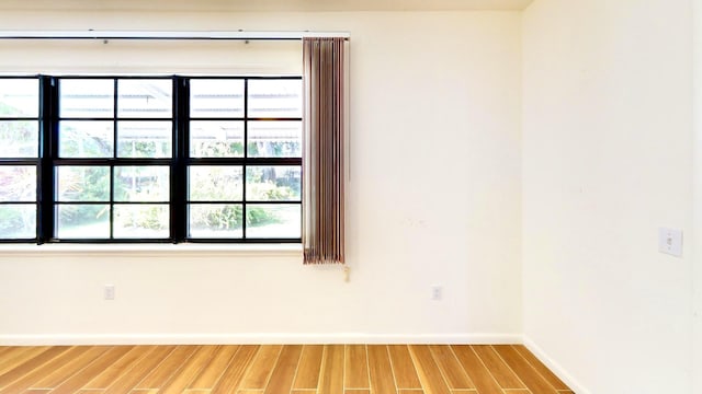 479 SE Verada Ave, Port Saint Lucie, FL 34983 - spare room featuring baseboards and light wood finished floors