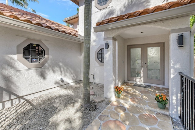 view of exterior entry with french doors