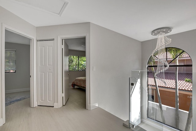 hallway with light wood-type flooring