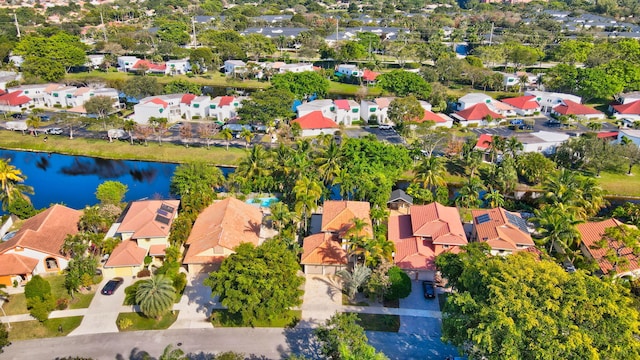 drone / aerial view with a water view