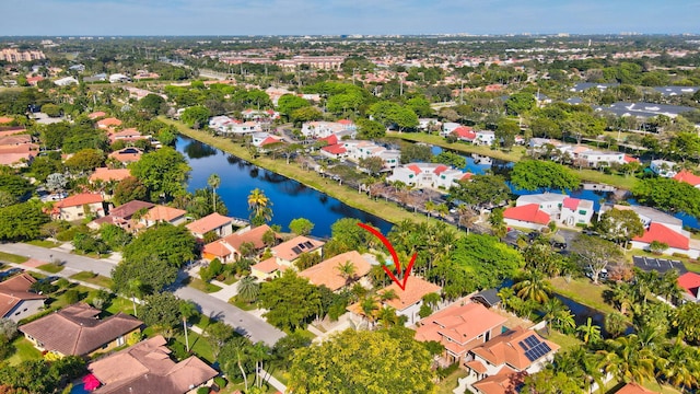 drone / aerial view featuring a water view