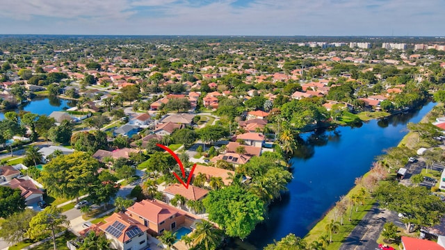 drone / aerial view featuring a water view