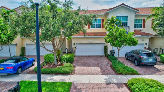 view of front of property with a garage