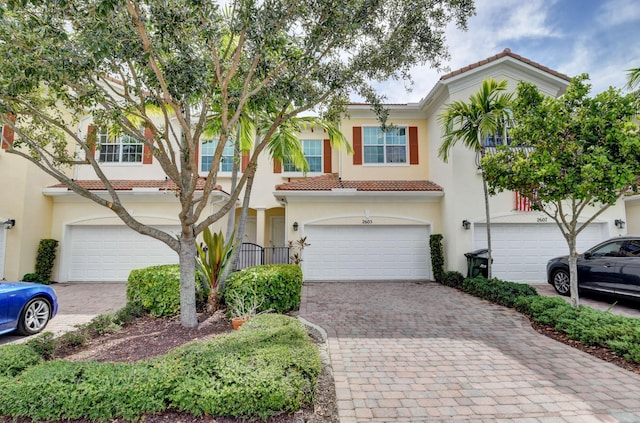 view of front of property with a garage