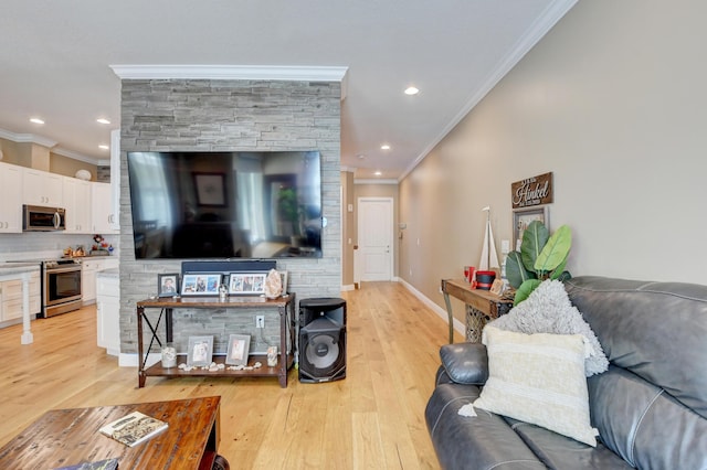 living room featuring crown molding and light hardwood / wood-style floors