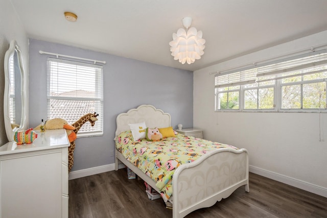 bedroom featuring dark wood-type flooring