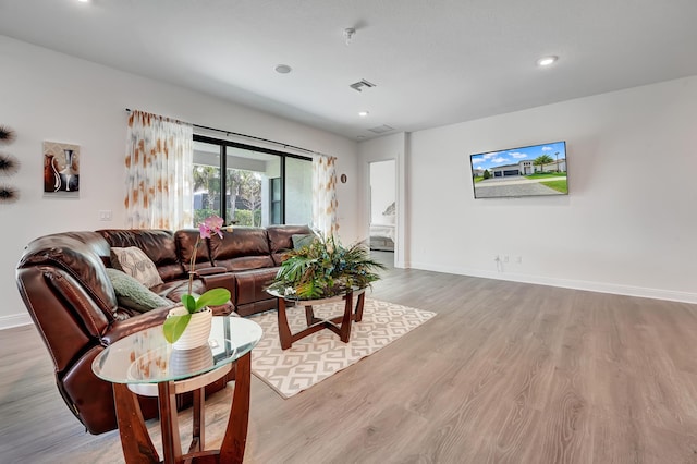 living room featuring light hardwood / wood-style floors