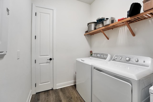 clothes washing area with laundry area, baseboards, dark wood-style flooring, and independent washer and dryer