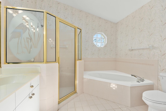 full bathroom featuring toilet, tile patterned flooring, separate shower and tub, and vanity