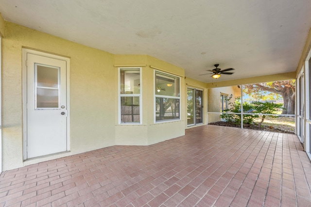 view of patio featuring ceiling fan