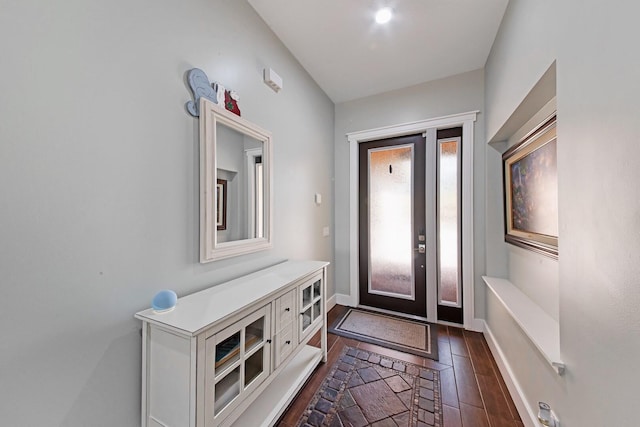 entryway featuring dark wood-type flooring