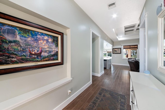 hall with dark hardwood / wood-style flooring