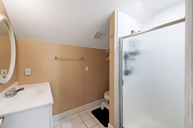 bathroom with vaulted ceiling, a shower with shower door, tile patterned flooring, vanity, and a textured ceiling