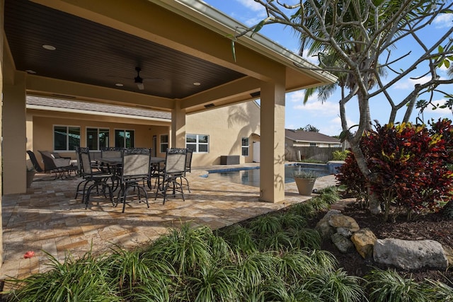 view of patio / terrace featuring ceiling fan