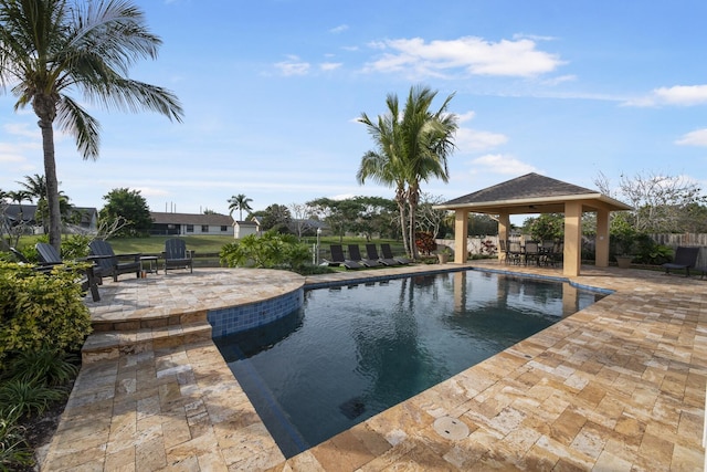 view of swimming pool with a gazebo and a patio area