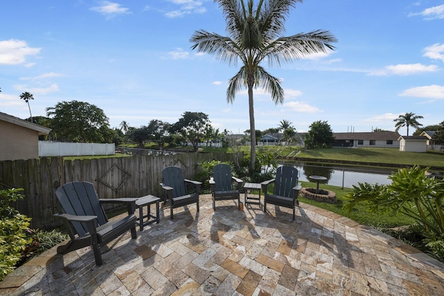 view of patio / terrace with a water view