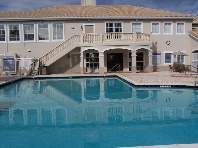 view of pool featuring a patio